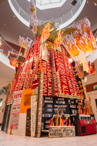 Bob and Roberta Smith, Bonfire (2010). Paint on found timber, recycled artwork from the artist’s studio, approximately 6 x 3 metres, Kilkenny County Hall. 